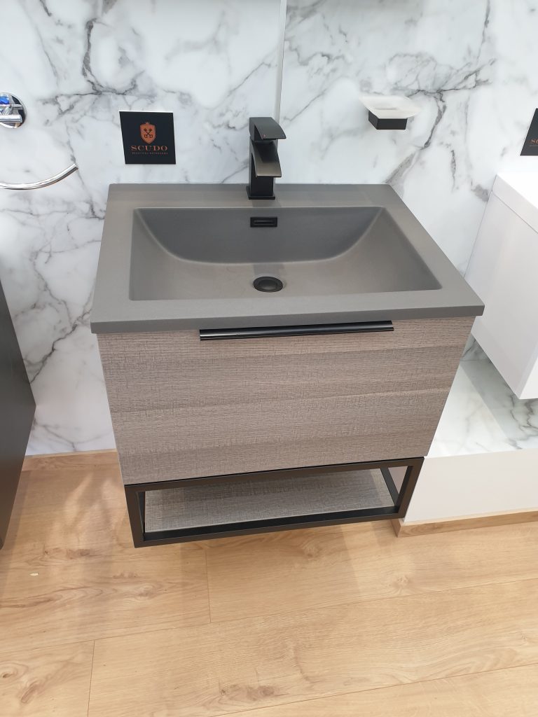 A grey sink in the travelling bathroom showroom