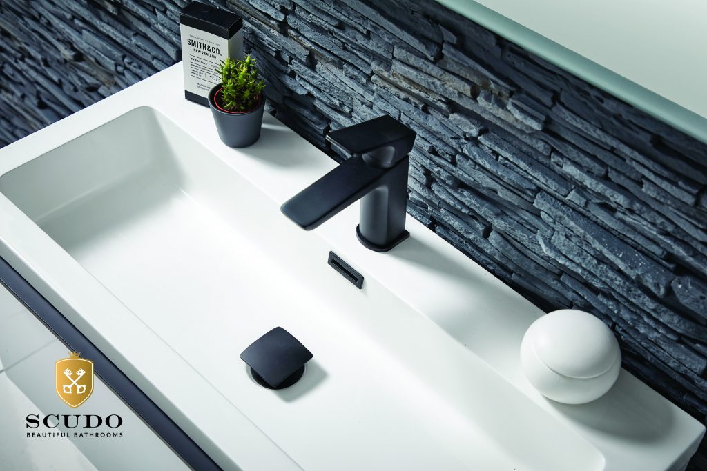 Contemporary matte black taps and plug